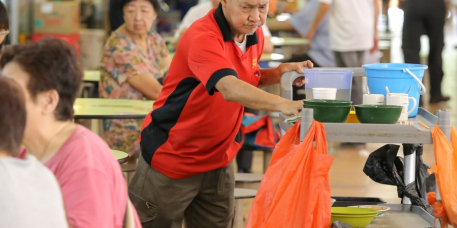 A cleaner at a hawker centre